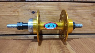NOS &Kappa;έ&nu;&tau;&rho;&omicron; &Omicron;&pi;ί&sigma;&theta;&iota;&omicron; ACS High Flange Rear Hub 36H USA 10mm Axle Old School Gold